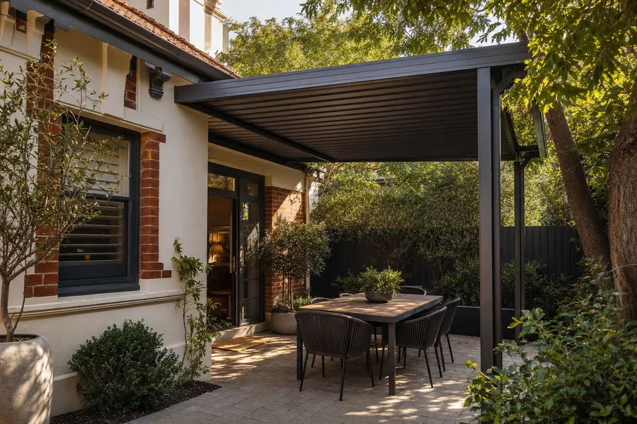 Attached steel pergola over a courtyard alfresco at a Subiaco character home in Perth's inner west